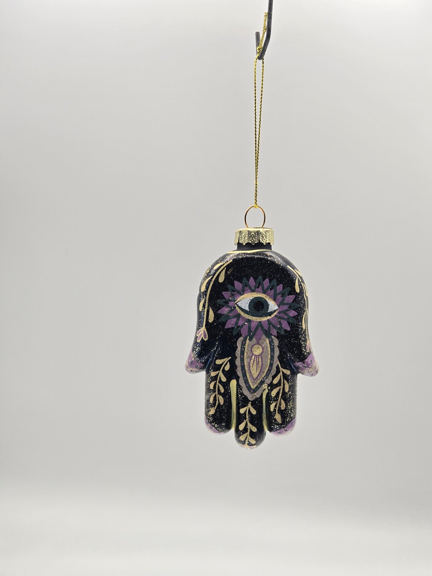 Schwarze Hand "Hand der Fatima" mit gold-lila Verzierung