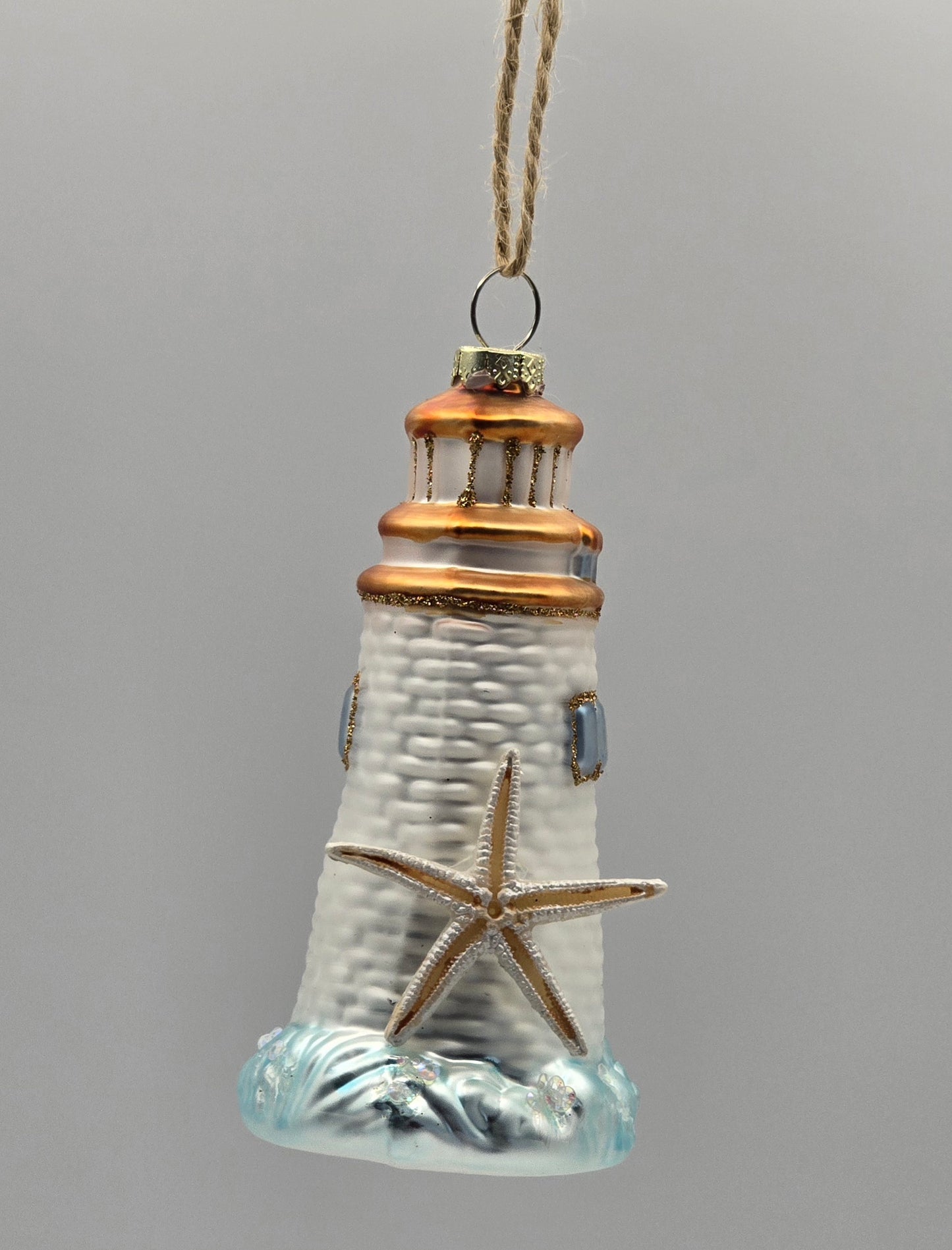 Maritimer Leuchtturm mit Seestern