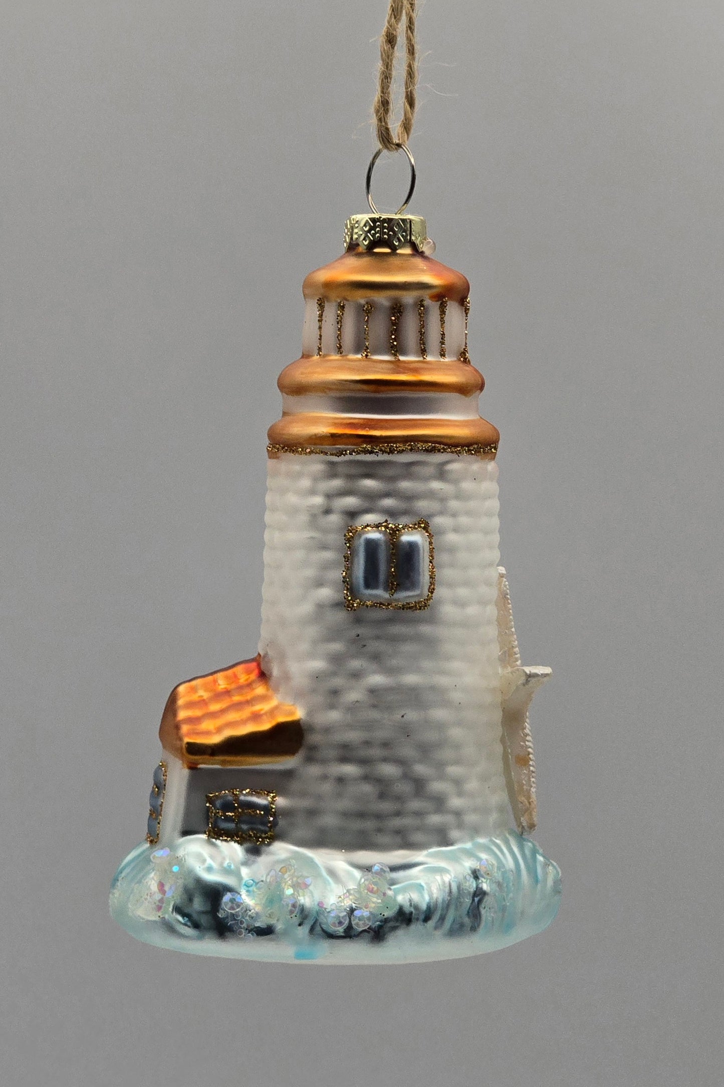 Maritimer Leuchtturm mit Seestern