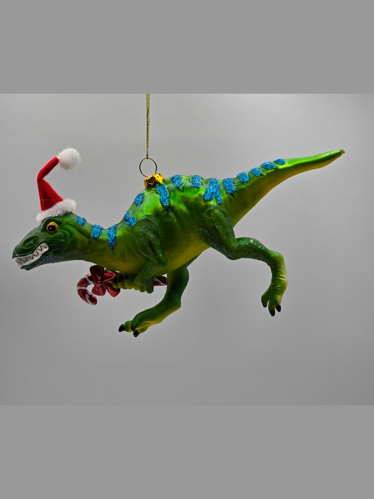 T-Rex Dinosaurier grün mit Zuckerstange & Weihnachtsmütze