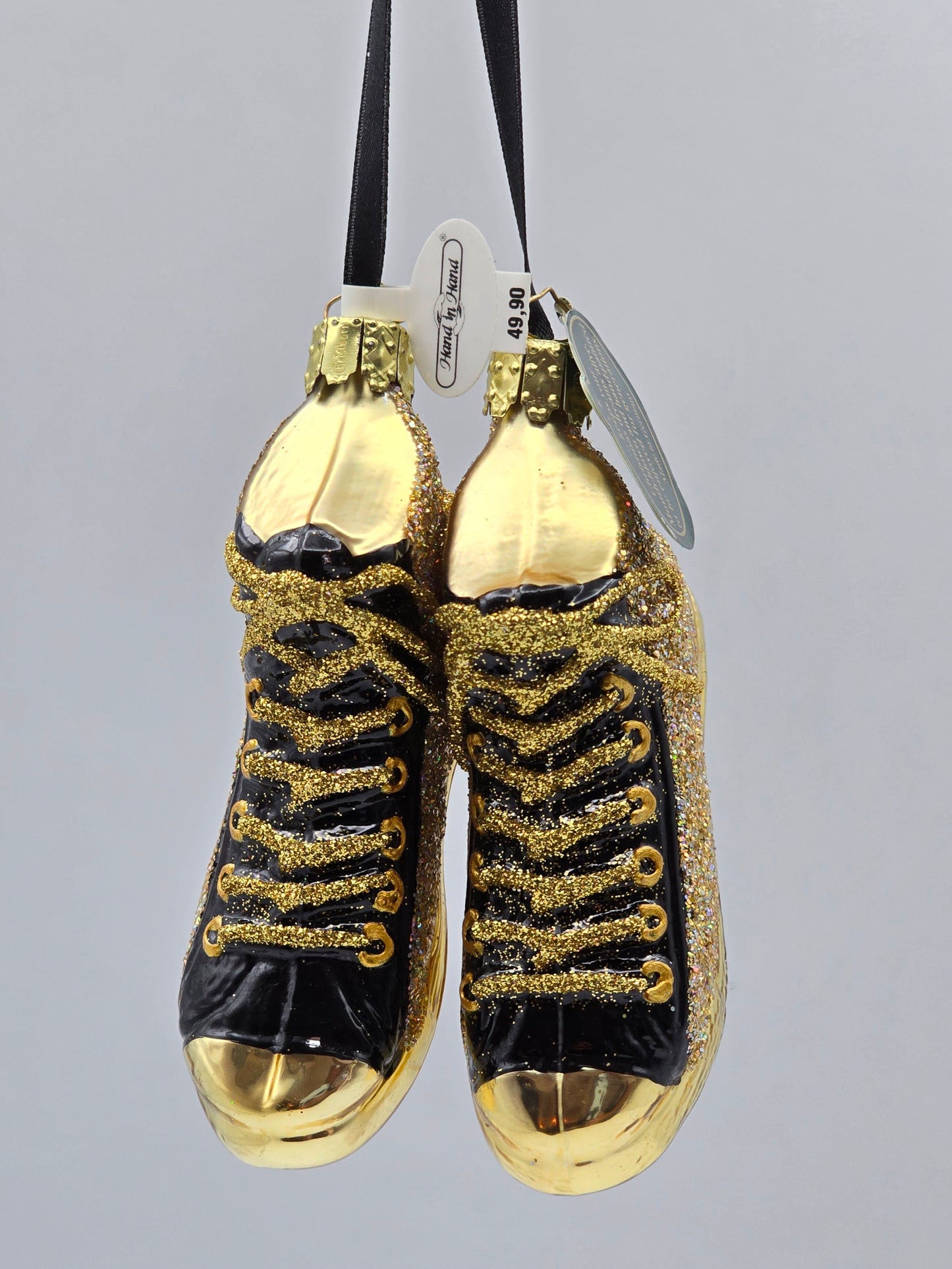 Paar Schuhe gold-schwarz