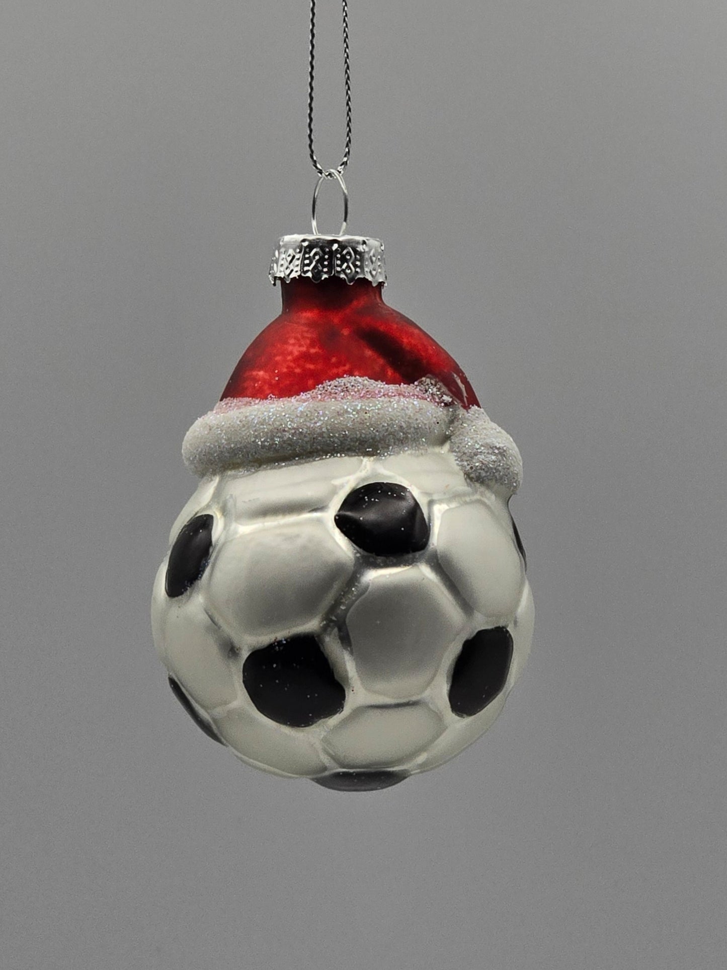 Fußball mit Mütze