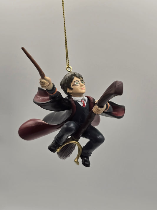 Warner Bros Harry Potter auf Besen mit Zauberstab