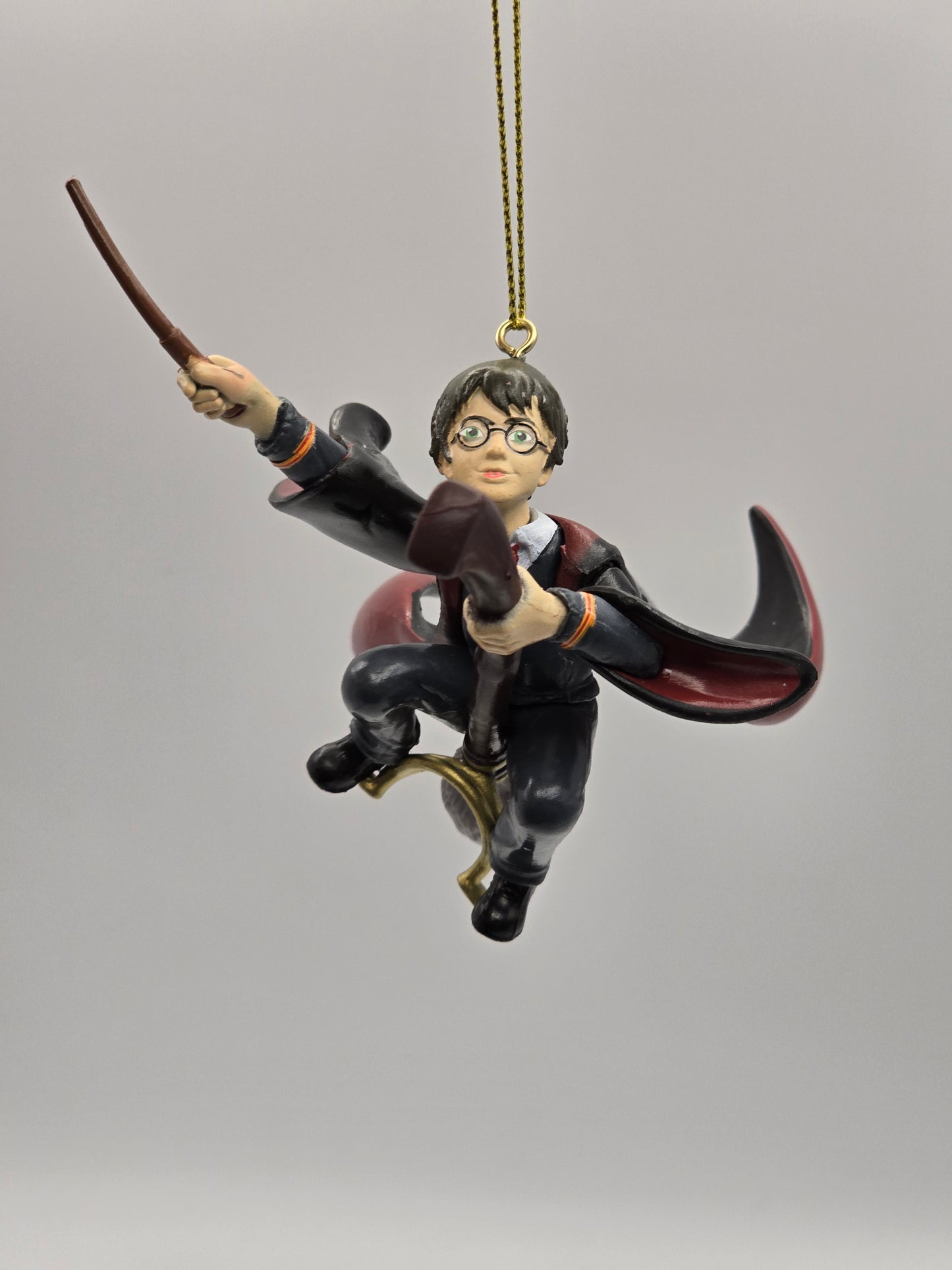 Warner Bros Harry Potter auf Besen mit Zauberstab