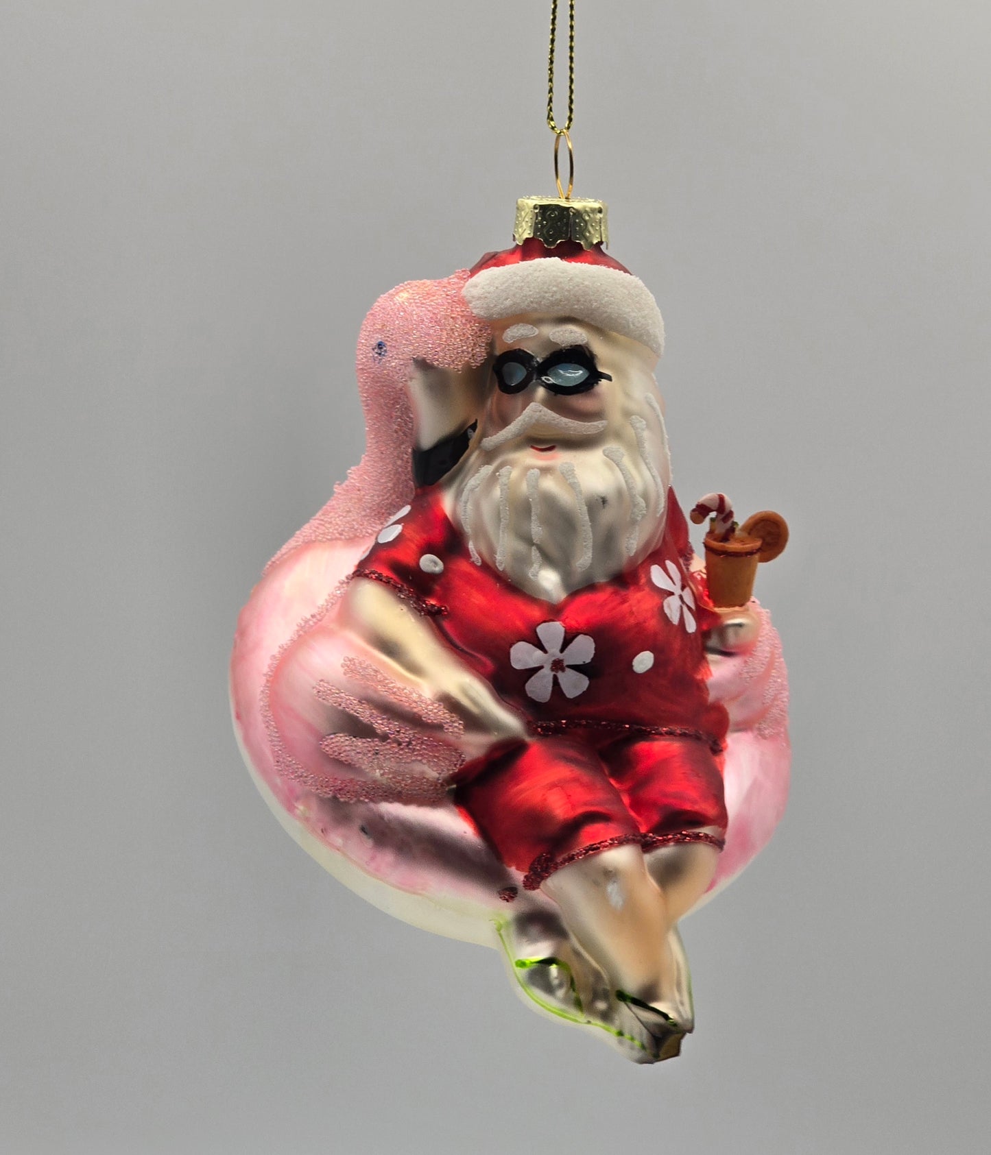 Weihnachtsmann mit Schwimmring Flamingo rosa
