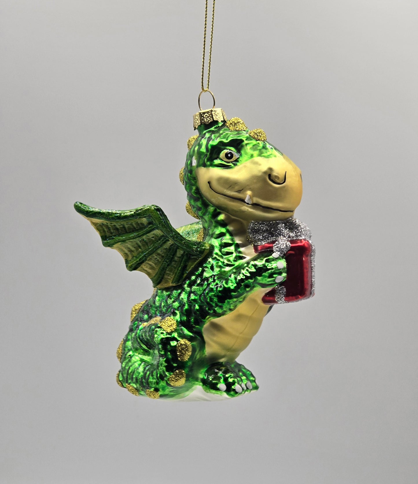 Drache grün mit Geschenk