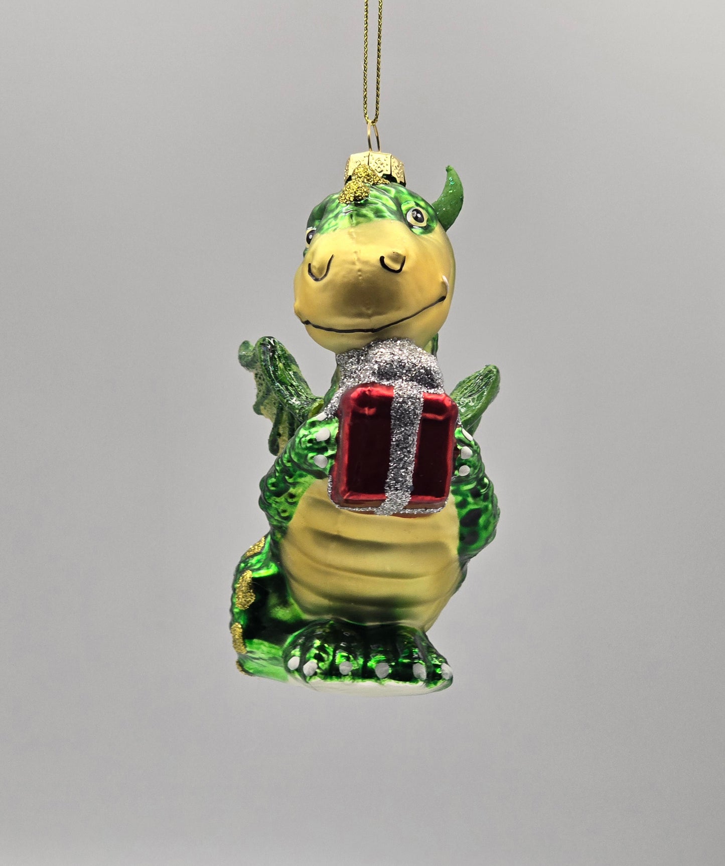 Drache grün mit Geschenk