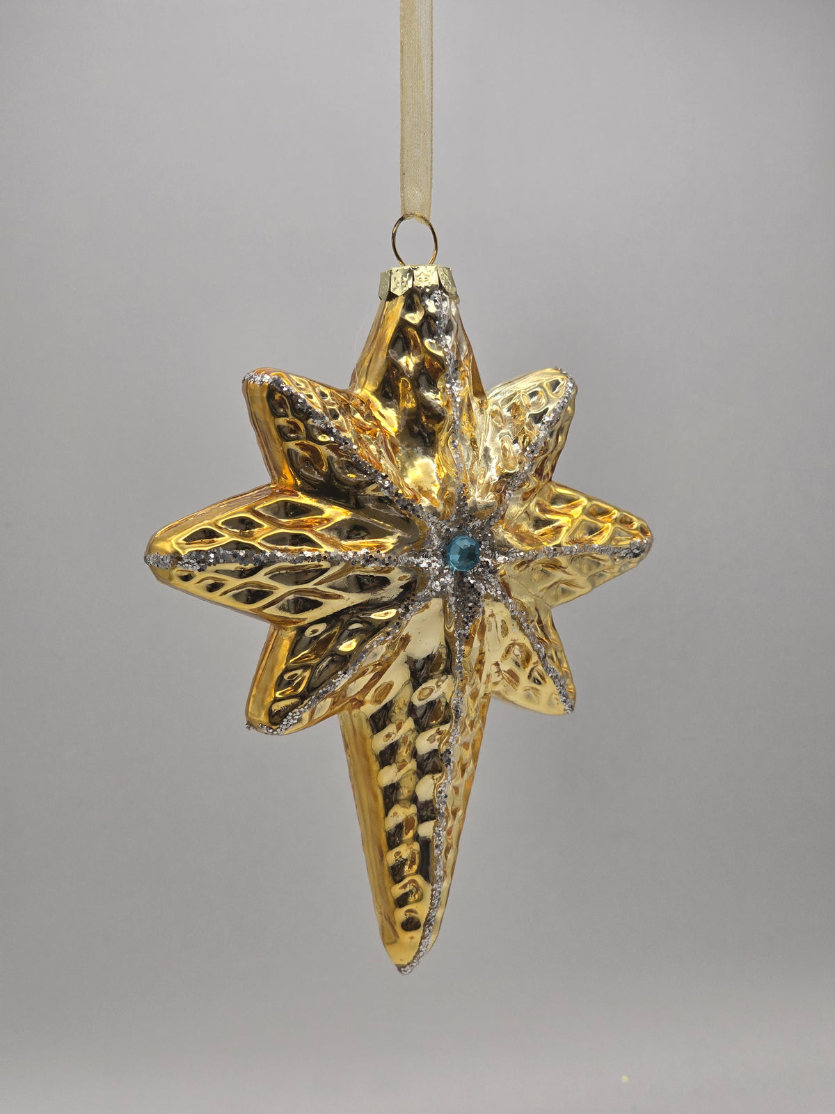 Goldener Stern Schneeflocke silber verziert mit blauen Stein #26