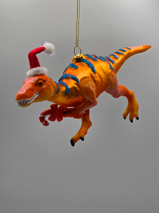 T-Rex Dinosaurier orangefarben mit Zuckerstange & Weihnachtsmütze
