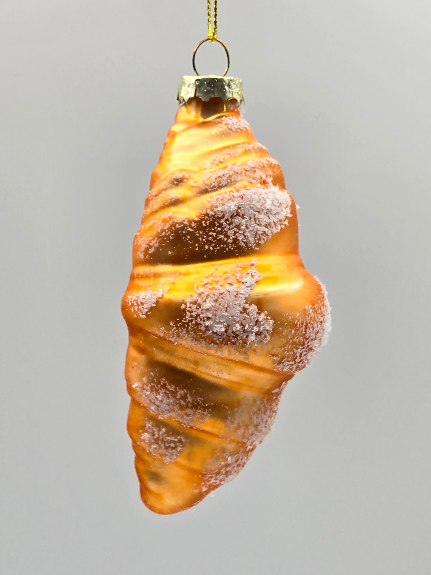 Croissant mit Puderzucker